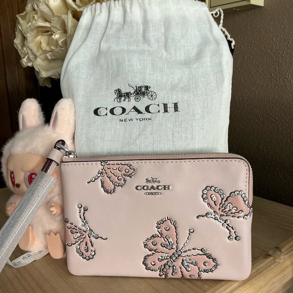 Coach Blush Butterfly Rivets Corner Zip Wristlet plus a Pop Mart lil’ Monster - Picture 6 of 15